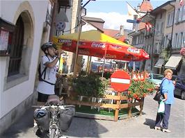 Luke enjoys a much-needed drink at Estavayer-le-Lac, 14.1 miles into the ride